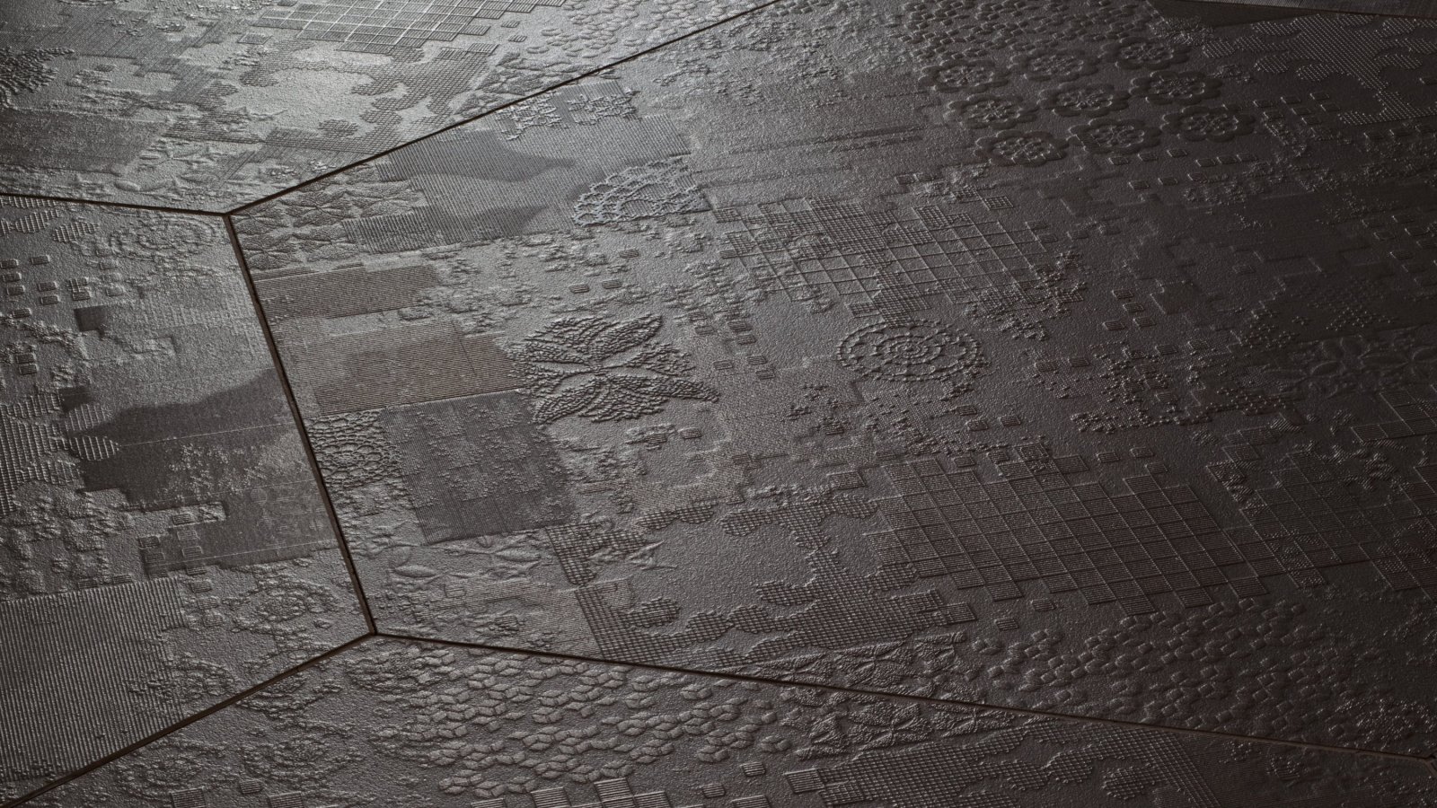 コンクリート調浮彫の Mutina Déchirer 磁器質タイル床