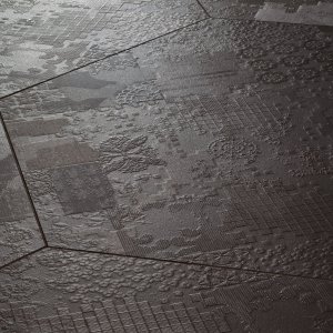 コンクリート調浮彫の Mutina Déchirer 磁器質タイル床